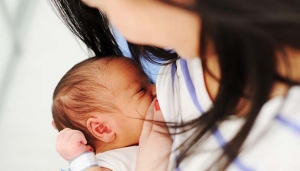 Mother Breastfeeding her newborn baby