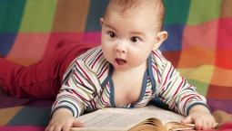 Baby reading a book